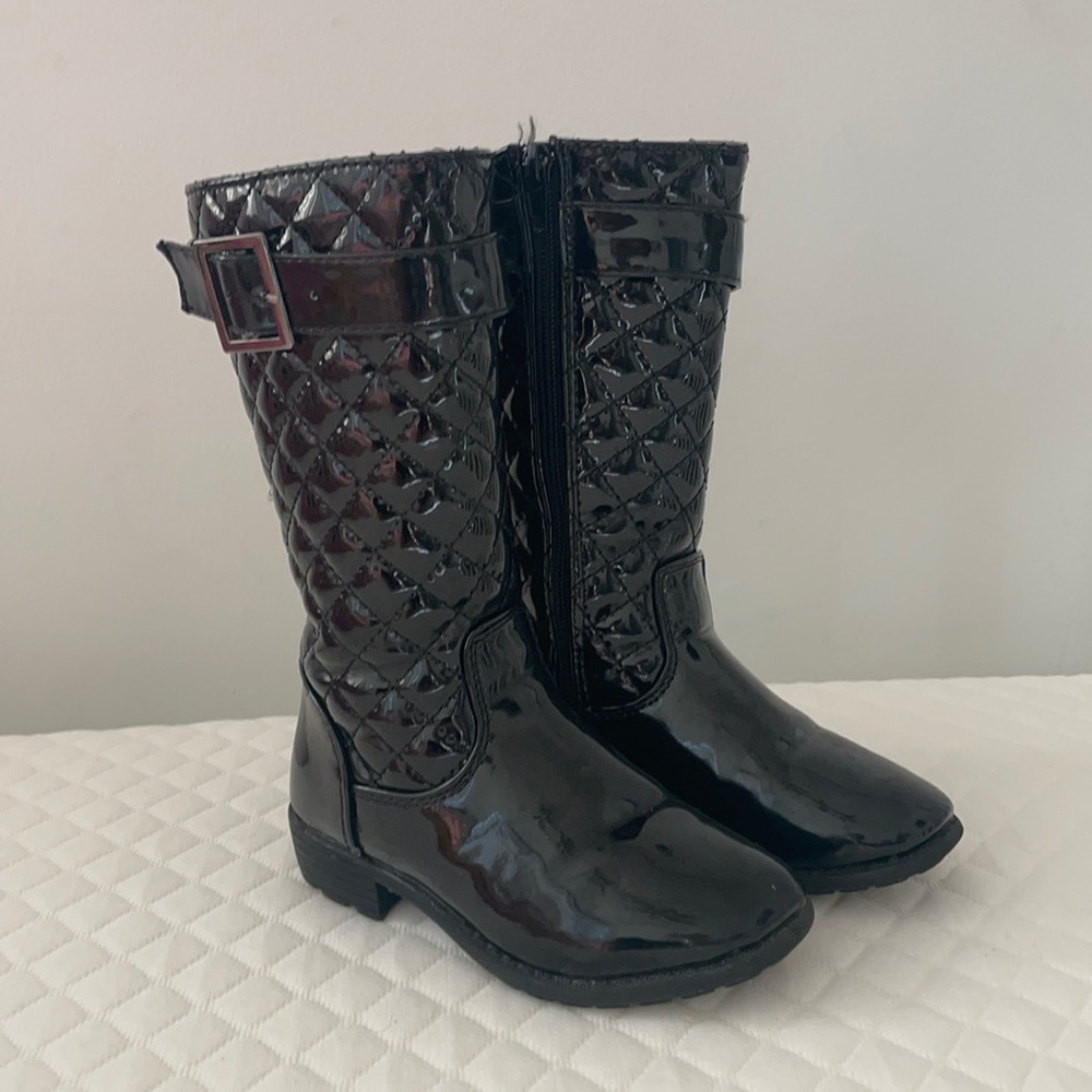 Patent style riding boot with buckle. So stylish.
